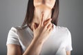 a young woman has a sore throat Royalty Free Stock Photo