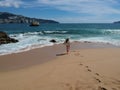 Woman in hat at tropical beach Acapulco, Mexico Royalty Free Stock Photo