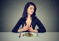 Young woman hates vegetarian diet Royalty Free Stock Photo