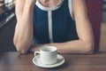 Young woman having coffee in diner Royalty Free Stock Photo