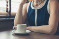 Young woman having coffee in diner Royalty Free Stock Photo