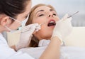 Young woman having dental checkup Royalty Free Stock Photo