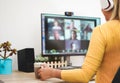 Young woman having a discussion meeting in video call with her team - Girl having chatting with friends on computer web app - Royalty Free Stock Photo