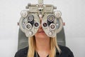Young woman is having eye exam performed by eye doctor Royalty Free Stock Photo