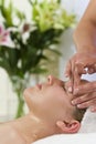 Young Woman Having Facial Massage Treatment