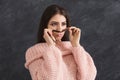 Young woman having fun on grey background portrait Royalty Free Stock Photo