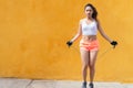 Young woman having fun with jump rope
