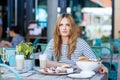 Young woman having healthy breakfast in outdoor Royalty Free Stock Photo