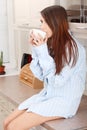 Young woman having morning coffee Royalty Free Stock Photo