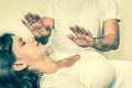 Young woman having reiki healing treatment - retro style Royalty Free Stock Photo