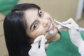 Young woman having teeth examined by dentist in dental clinic, teeth check-up and Healthy teeth concept Royalty Free Stock Photo