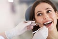 Woman having teeth examined at dentists Royalty Free Stock Photo