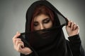 Young woman with head covered by a black veil Royalty Free Stock Photo