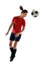 Young Woman HEading Soccer Ball Royalty Free Stock Photo
