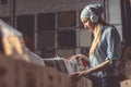 Young woman with headphones browsing vinyl records Royalty Free Stock Photo