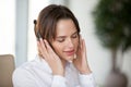 Young woman in headphones enjoying pleasant good music for relax Royalty Free Stock Photo