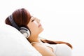 young Woman with headphones listening music Royalty Free Stock Photo