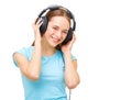 Young woman with headphones listening to music and dancing Royalty Free Stock Photo