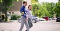 Young Woman Helping Blind Man With White Stick Royalty Free Stock Photo