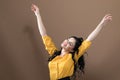 Young woman with her arms outstretched Royalty Free Stock Photo