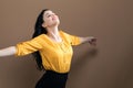 Young woman with her arms outstretched Royalty Free Stock Photo