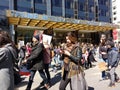 Walking With Cell Phone, March for Our Lives, Protest, Gun Control, Trump International Hotel & Tower, NYC, NY, USA Royalty Free Stock Photo