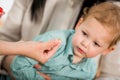 Young woman and her child at the doctor homeopaths Royalty Free Stock Photo