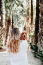 young woman and her cute puppy of cocker spaniel outdoors in a park Royalty Free Stock Photo