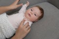 Young woman with her little baby resting after breast feeding at home Royalty Free Stock Photo