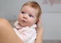 Young woman with her little baby resting after breast feeding at home Royalty Free Stock Photo
