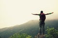 Young woman hiker open arms outdoor Royalty Free Stock Photo