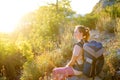 Young woman hiking in countryside. Backpacking hike Royalty Free Stock Photo