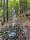 Woman near mountain gazer