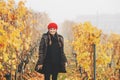 Young woman hiking in Lavaux vineyards in autumn Royalty Free Stock Photo