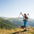 Young woman hiking in the mountains Royalty Free Stock Photo