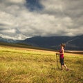 Young woman hiking in the mountains Royalty Free Stock Photo