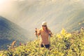 Young Woman hiking Travel Lifestyle concept Summer journey Royalty Free Stock Photo