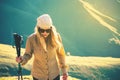 Young Woman hiking with trekking poles Travel Lifestyle concept Royalty Free Stock Photo