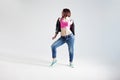 Young woman hip hop dancer, in the Studio on a Royalty Free Stock Photo