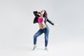 Young woman hip hop dancer, in the Studio on a Royalty Free Stock Photo