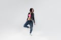 Young woman hip hop dancer with white background Royalty Free Stock Photo