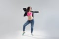 Young woman hip hop dancer with white background Royalty Free Stock Photo