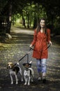 Young woman and his dogs Royalty Free Stock Photo