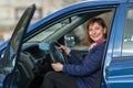 A young woman in his new car. Education. Royalty Free Stock Photo