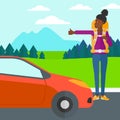 Young woman hitchhiking.