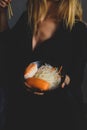 Young woman hold bowl in her hands full of funchose and sushi with salmon and srhrimp.