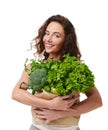 Young woman hold grocery paper shopping bag full of fresh green vegetables Royalty Free Stock Photo