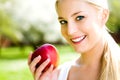 Young woman holding apple Royalty Free Stock Photo