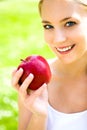 Young woman holding apple Royalty Free Stock Photo