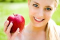 Young woman holding apple Royalty Free Stock Photo